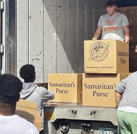 Demons load shoeboxes to travel the world