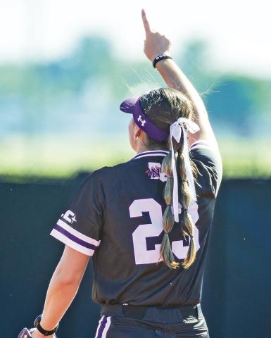Makynlie Jones signals one during a fall exhibition game. Photo by Chris Reich, NSU Photographic Services