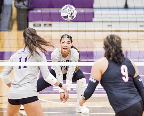 Northwestern State’s Makenna Tyron goes for the kill.
