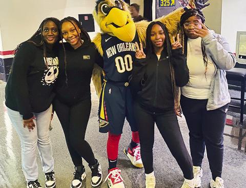 From left are Iyrlen Horn, Myricle Hart, Pierre the Pelican, Amia Randolph and Kaylei Shelvin.