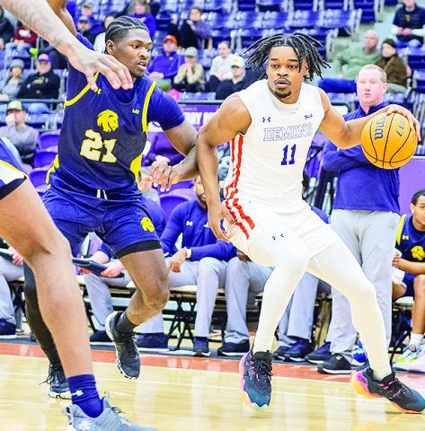 Northwestern State’s Chris Mubiru (right) will play for the Ugandan national team in August’s FIBA Afrobasket Tournament. Photo by Chris Reich/NSU Photographic Services