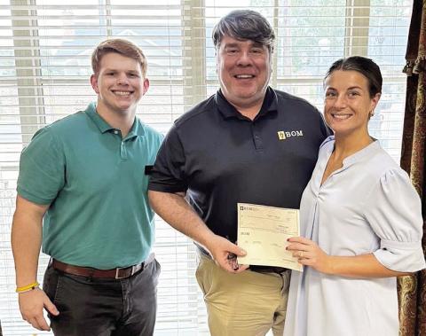 BOM sponsored the Natchitoches Coastal Conservation Association Banquet. The organization is dedicated to conserving Louisiana’s marine resources. Pictured from left are BOM’s Levi Endris, David Guillet, and Mary Scruggs.