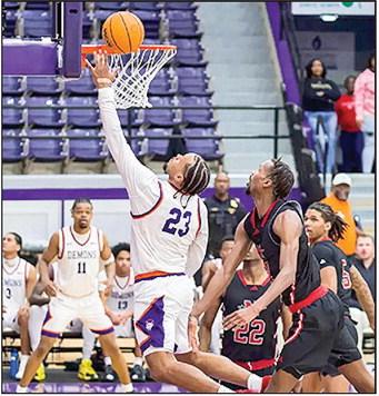 In a defensive battle defined by missed opportunities and late drama, Northwestern State came up just short Saturday night, falling 52-48 to East Texas A&amp;M at the Field House. Pictured is Willie Williams , who scored 10 points and snagged 15 rebounds for his fourth double-double of the season. Photo by Chris Reich, NSU Photographic Services