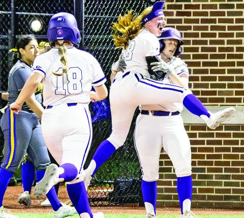 JT Smith celebrates with Sister Arnold following NSU’s 7-6 walk-off win against McNeese. Photo by Zoey Fitts, NSU Photographic Service