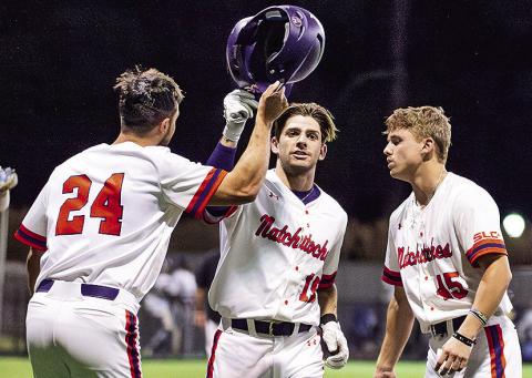 Reese Lipoma (left) and Hudson Brignac (right) congratulate Samuel Stephenson after Stephenson’s go-ahead three-run home run Tuesday night against Southern-New Orleans. Photo by Chris Reich/NSU Photographic Services
