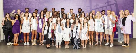 A group of graduating Northwestern State student-athletes pose following the spring stole ceremony in May. Photo by Chris Reich/NSU Photographic Services