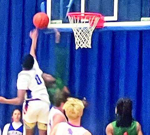 St Mary’s Tiger #0 AJ Johnson blocks the Gator shot.
