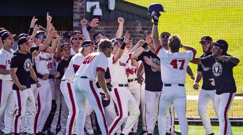 Northwestern State’s team celebrates Colton Harrison’s go-ahead, tworun home run Sunday. Photo by Chris Reich/NSU Photographic Services.