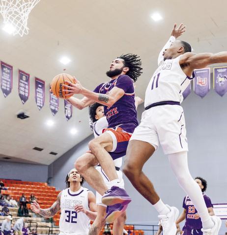 Addison Patterson (center) led Northwestern State with 23 points and 10 rebounds in Saturday’s loss to Stephen F. Austin. Photo by Chris Reich/NSU Photographic Services