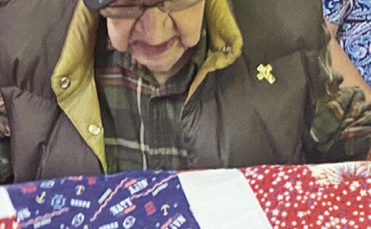 WWII Veteran Raymond Cedars receives a quilt
