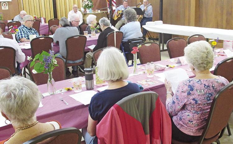 A long-time Christian fellowship for seniors is Young at Heart that met May 7 in the First United Methodist Church Fellowship Hall. Johnnie Dunn and Buster Jordan entertained. See details Page 2A.