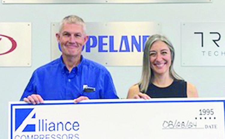 Alliance Compressors donated $5,000 to the Natchitoches Economic Development Alliance which has as its mission to “Champion Investment, Maximize Potential, and Cultivate Growth in Natchitoches Parish.” From left are Brian Brock, Alliance Plant Manager; and Laura Lyles, president and CEO of the Natchitoches Area Chamber of Commerce and Executive Director of the Natchitoches Economic Development Alliance.