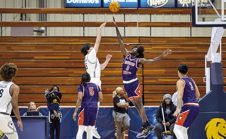 Northwestern State’s Jerald Colonel (2) challenges a shot by East Texas A&amp;M’s Tay Mosher on Saturday. Credit: Elayna Felder/East Texas A&amp;M Athletics