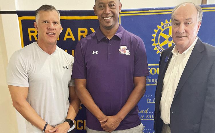 Rotarian with the Program Mike Newton introduced Northwestern State University Men’s Basketball Coach Rick Cabrera at the Nov. 5 luncheon. Cabrera gave an overview of the basketball program and answered questions. From left are President Jesse Taitano, Cabrera and Newton.`