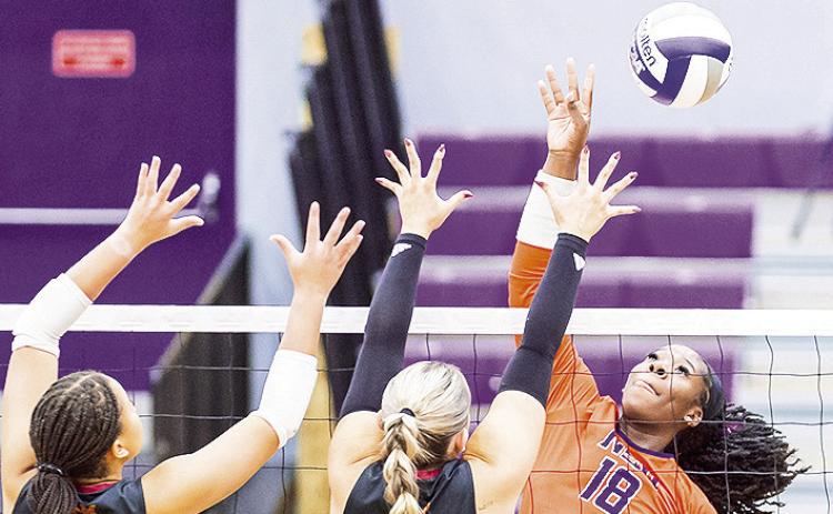 Deja Benjamin attempts a kill. Photo by Chris Salim