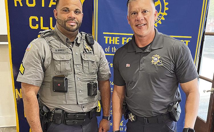 Rotary President Jesse Taitano introduced the Natchitoches Parish Sheriff’s Office School Resource and D.A.R.E. Officer Sgt. David Dorsey at the March 25 luncheon. Dorset spoke about the importance of school safety and drug education. From left are Dorsey and Taitano.
