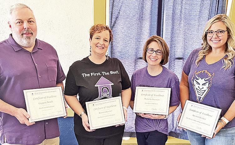 Faculty earning awards from NSU’s School of Education are, from left, Dr. Greg Bouck, Dr. Katrina Jordan, Dr. Michelle Fazio-Brunson and Kristen Walker.