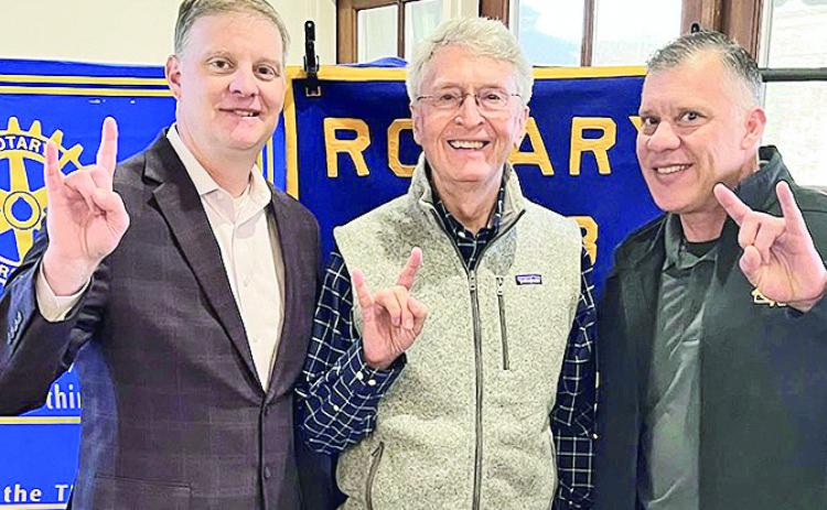 Rotarian with the Program Rick Harrington introduced the NSU Athletic Director Kevin Bostian at the January 7 luncheon at Merci Beaucoup. Bostian reported on the status of the NCAA $2.78 billion athlete settlement payout and it’s effects on NSU and Division 1 schools. Pictured from left are Bostian, Harrington, and Rotary President Jesse Taitano.