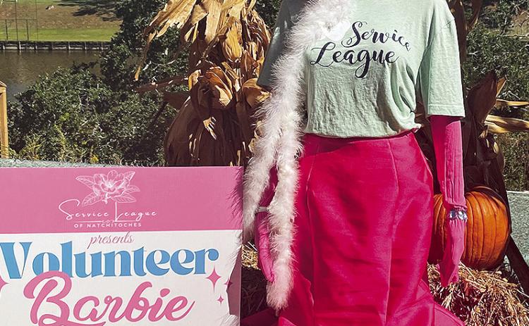 The Natchitoches Service League showcases its creativity by dis playing Volunteer Barbie in this year’s Crows on the Cane contest. The annual event to ring in fall drew some one dozen artistic exhibits on Front St. by various businesses and organizations.