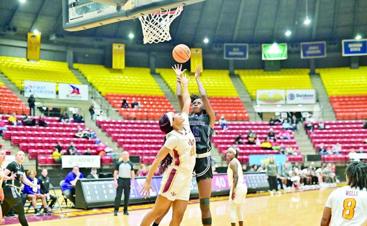 Jasmin Dixon goes up for a shot against ULM. Photo by Dezmond Jackson, ULM Athletics