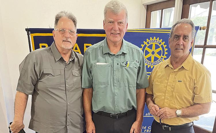 Rotary President Louie Bernard welcomed Dave Cupp with Walsh Timber Company at the July 29 Rotary luncheon at Merci Bracoup. Cupp discussed Carbon Capture Sequestration and answered questions. From left are David Young, Cupp and Bernard.