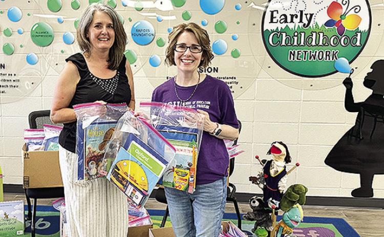 From left are Janna Maggio, M.Ed., Natchitoches Parish School Board Early Childhood coordinator and NSU Early Childhood adjunct instructor, and Fazio-Brunson, director of NSU Graduate Programs in Early Childhood Education.