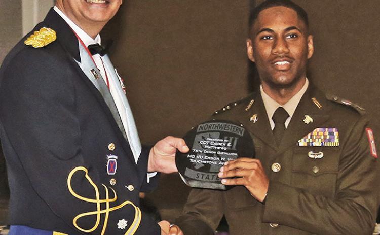 Cadet Caiden Mathews, right, a graduating senior from Shreveport, was named recipient of the MG (R) Erbon W. Wise Touchstone Award during NSU’s 75th Demon Battalion Military Ball. The Touchstone Award is presented annually to a cadet who is the model of good citizenship. LTC Joshua Drake presented the award.