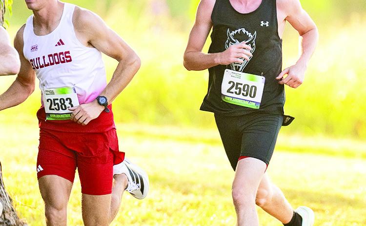 Tyler Newland (pictured, in black) helped lead Northwestern State in a strong day for the freshmen, clocking a 27:30.0 to lead the way for the Demons at the Watson Cross Country Classic, the final tune-up prior to the Southland Conference Championships on Oct. 30.