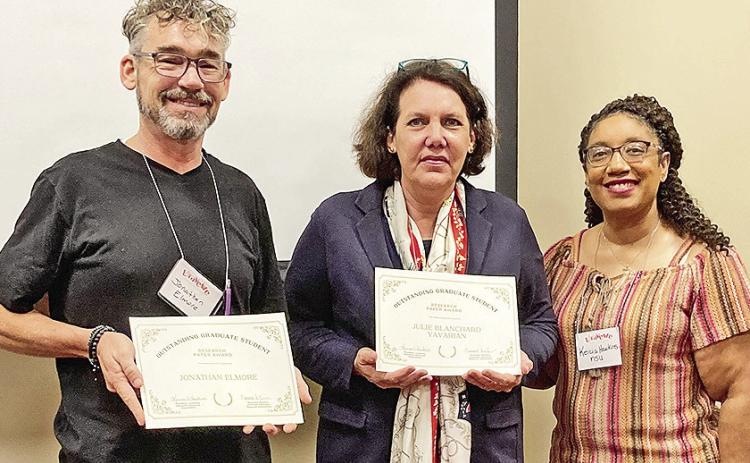 Dr. Julie Yavarian, center, won the LERA Outstanding Graduate Research Awards. Dr. Jonathan Elmore, assistant professor of Adult Learning and Development at NSU, was her research chair. Dr. Keicia Hawkins, right, president of LERA’s executive board and NSU faculty, presented the awards.