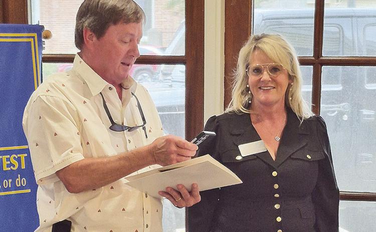 Rotarian Sidney Evans introduced and welcomed new Rotary member Heidy McWhorter Mongeon at the Aug. 25 meeting of Rotary of Natchitoches.