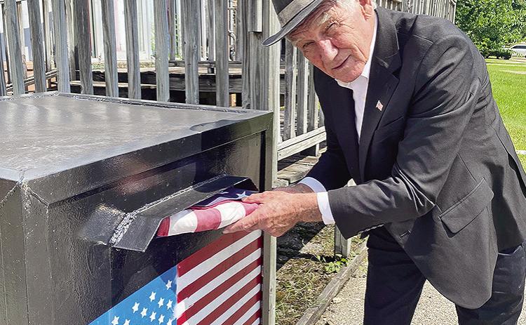 There are four proper flag retirement options for the American flag. They are burying, using a flag disposal box, recycling and burning, a. Pictured is District 3 Parish councilman Wayne Halm, who is also a U.S. Veteran, placing a worn American Fag into the Disposal Box located at the American Legion Post 10 and VFW Post 1962 building at the corner of St. Denis and Fourth Streets.