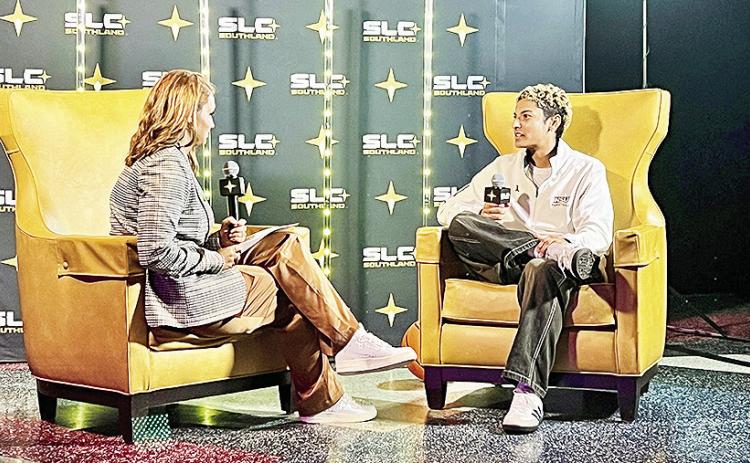 Northwestern State’s Jiselle Woodson (right) speaks during Southland Conference Media Day in Kinder on Tuesday. Photo by Brad Welborn/ NSU Sports Information
