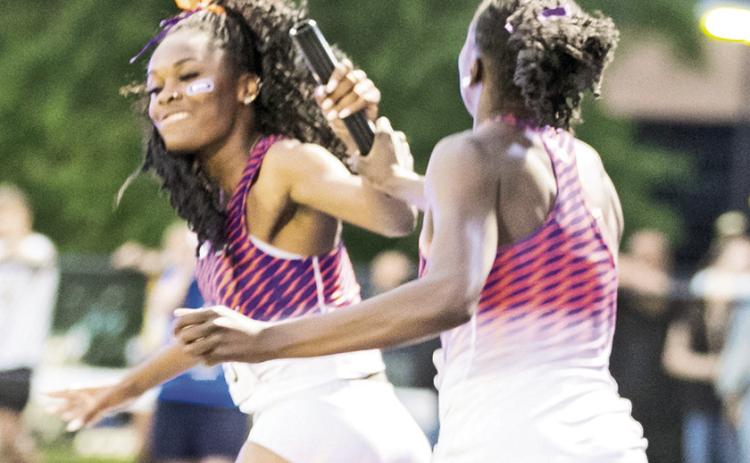 Tranasia Jones (pictured facing) and the Northwestern State women’s 4x400 relay team ran a 3:32.24 to place 16th at nationals. Photo by Prentice C. James