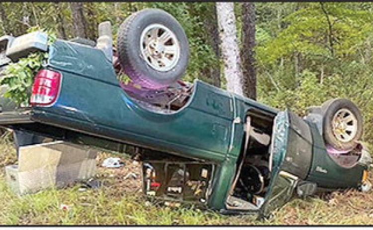 The driver of this vehicle received minor injuries when it overturned.