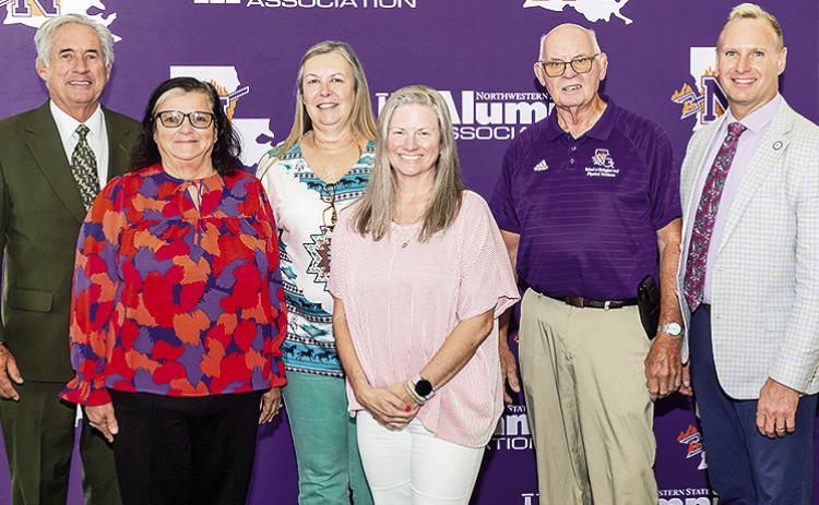 NSU President James Genovese and NSU Provost Dr. Greg Handel congratulated employees with 25 years of service. From left are Genovese, Carolyn Jones, Tammy Armstrong, Amber LaCaze, John Byrd and Handel.