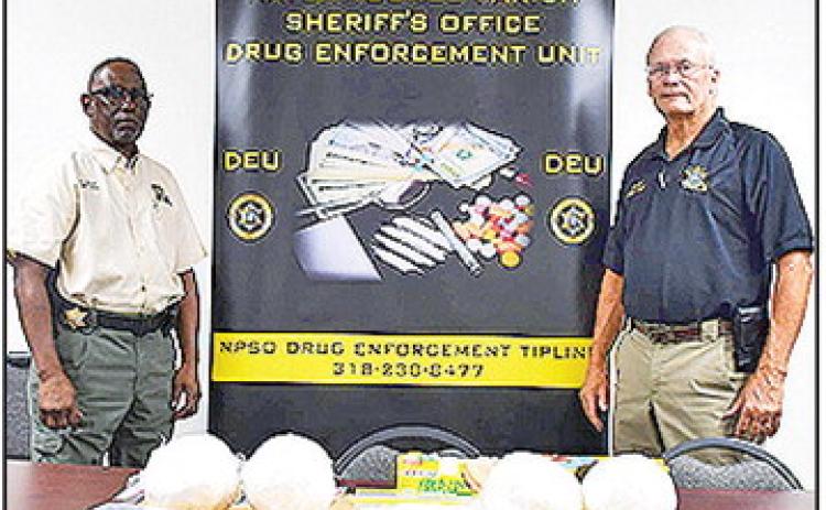 Natchitoches Parish Sheriff’s Office Chief Dep. Darrel Winder, left and Sheriff Stuart Wright display the approximately 10 pounds of methamphetamines seized during a traffic stop.