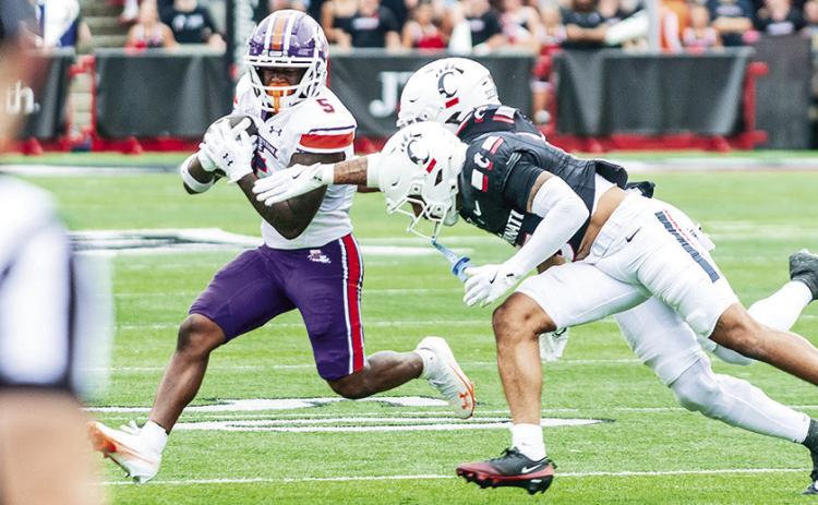 Northwestern State wide receiver Amaaz Eugene cuts upfield after making a catch against Cincinnati on Saturday. Photo by Brad Welborn/ NSU Sports Information