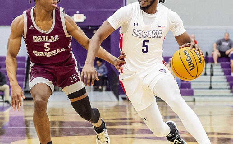 Micah Thomas (right) had 20 points in his return to his home state against Oklahoma on Monday night. Photo by Chris Reich/NOSU Photographic Services