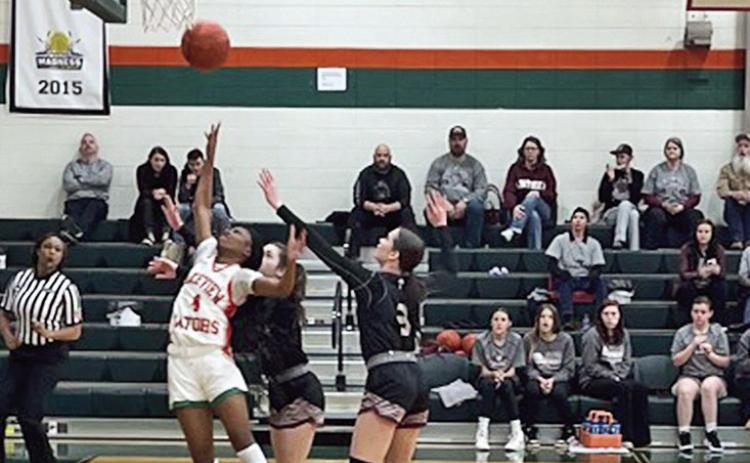 Lady Gator #4 Tiberlyn Washington leads the way with 24 points Monday night in the Non-Select Division IV regional play-off win against Merryville, 59-29. The No. 5 seeded Lady Gators advance to the Quarterfinals against No. 4 seeded LaSalle Thursday, Feb. 22. Courtesy photo by Chad Fredieu