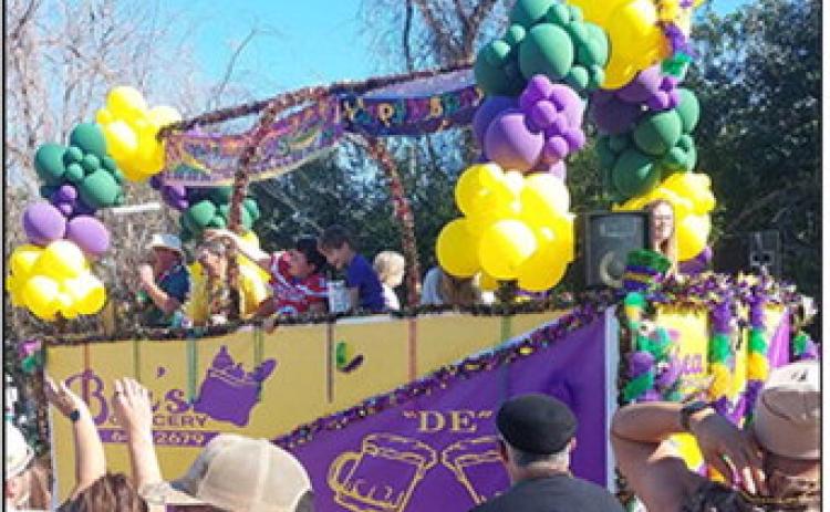 Floats, fire trucks, music and more filled the streets in the south end of the parish Saturday for family- friendly fun during the 20th Mardi Gras celebration in Cloutierville.