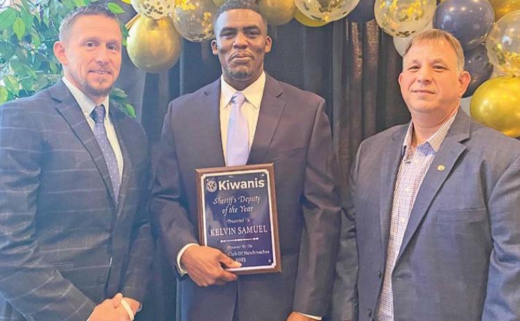 Deputy of the Year Kelvin Samuel (middle) with Dep. Jonathan Roberts (left) and Club President Craig George.