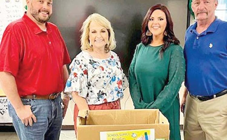 Provencal Elementary/Jr. High School was grateful for the generous donation of school supplies from the Natchitoches Kiwanis Club. From left are Kiwanian Craig Caskey, Principal Diana Curtis, Kiwanian Brittany Barton, and Coordinator Dwayne Poe.