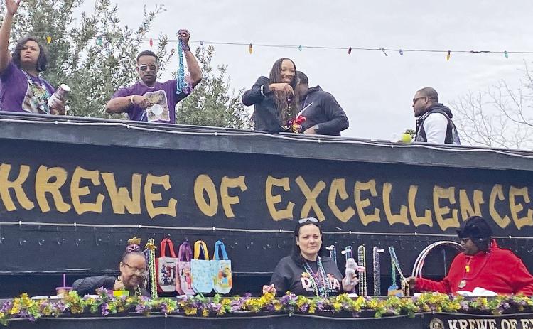he Krewe of Excellence parade rolled from the Northwestern State Campus west  to Front Street Saturday to openthe Mardi Gras season in Nachitoches.