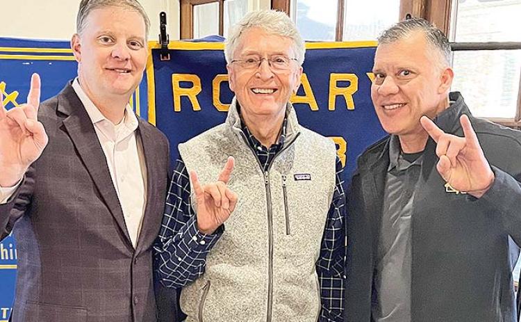 Rotarian with the Program Rick Harrington introduced NSU Athletic Director Kevin Bostian at the Jan. 7 luncheon at Merci Beaucoup. Bostian reported on the status of the NCAA $2.78 billion athlete settlement payout and it’s effects on NSU and Division 1 schools. From left are Bostian, Harrington and Rotary President Jesse Taitano.