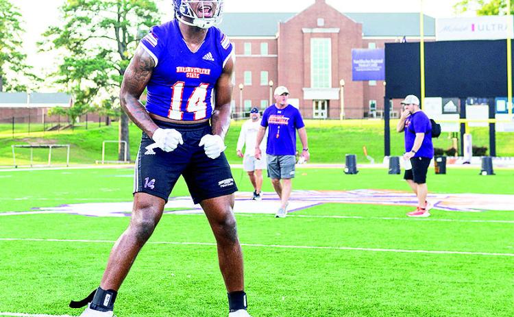 An excited Cadillac Rhone screams during Tuesday night’s opening practice of fall camp. Photo by Chris Reich/NSU Photographic Services