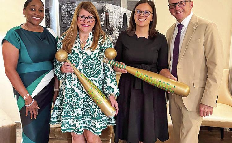 Dr. Todd Tarifa, right, and Dr. Kim Williams, left, presented Pam Pierce and Amanda Clark The Dynamic Duo Award during the President’s Parle’ at the LAE4-HAYDP Convention Pierce and Clark are 4-H agents who serve the youth of Natchitoches Parish.