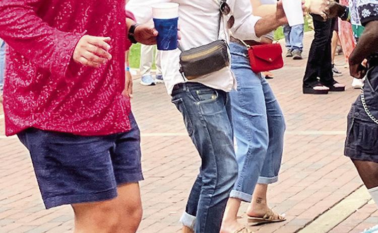 A line dance brought folks to their feet Saturday at the Natchitoches Rhythm &amp; Blues Jazz Festival. See Lifestyle Page 5A for more photos