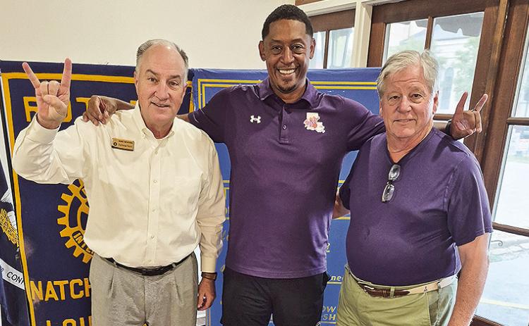 Rotarian with the Program John Luster welcomed Northwestern State University Head Men’s Basketball Coach Rick Cabrera who provided a preview of the upcoming basketball season at the Oct. 7 Rotary meeting and luncheon. From left are Mike Newton, Cabrera and Luster.