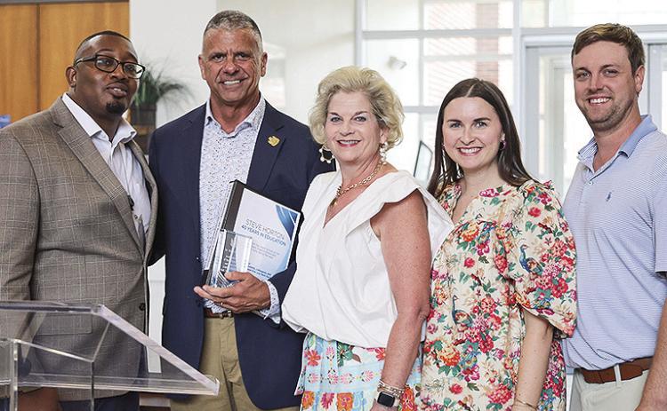From left are Dr. Jason Anderson, Dr. Steve Horton, Emilyn Horton, Dr. Mary-Katherine Maggio and Scott Maggio.