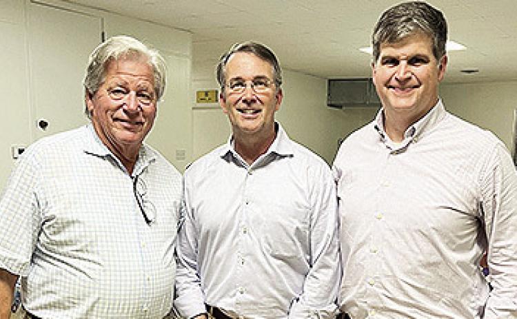 John Atkins, center, a candidate for the Fifth District seat on the Louisiana Public Service Commission was the guest speaker for the Agitators Club meeting Thursday at the Shrine Club. Atkins was the guest of local attorney John Luster, left, and his son, Dr. William “Bill” Luster.